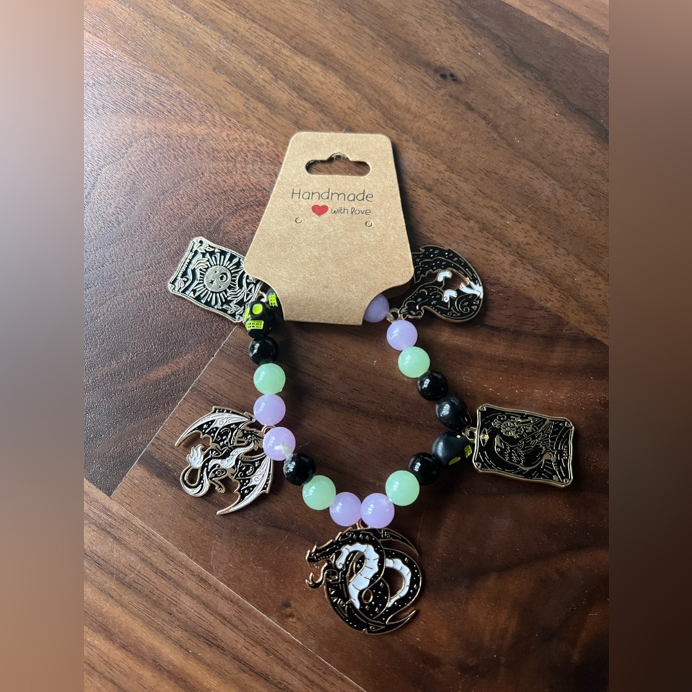 Mystical Charm Bracelet with Black and Gold Accents